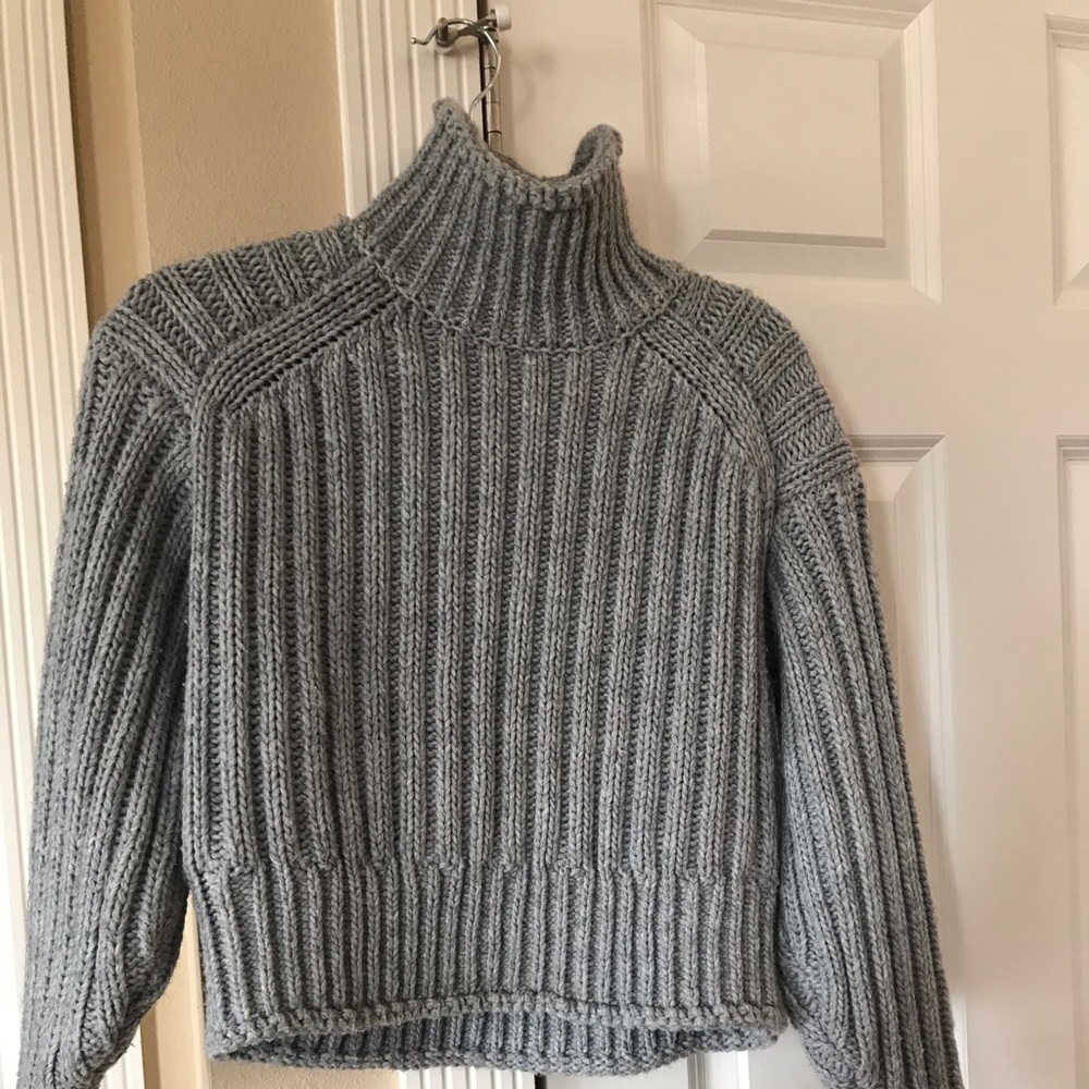 Turtleneck sweater. Perfect shape.  Never put in dryer.  Waist length.